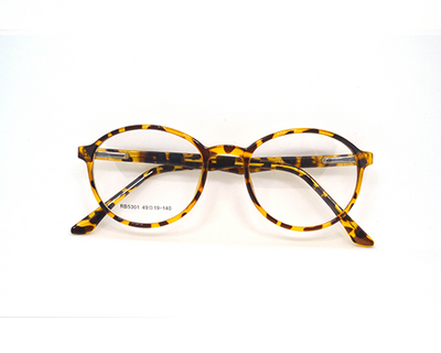 Tiger brown round frame in sheet material.