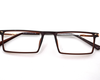 Non-breakable, rectangular frame in TR material for unisex. The metal sides are flexibles and non breakable.(Brown)