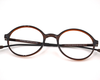 Non-breakable, round frame in TR material for unisex.(Brown)