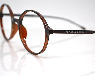 Non-breakable, round frame in TR material for unisex.(Brown)