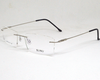 Silver color light weight Rimless frame for unisex, with spring.